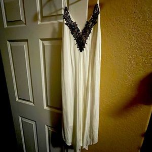 NWOT white with black lace dress. Never worn.